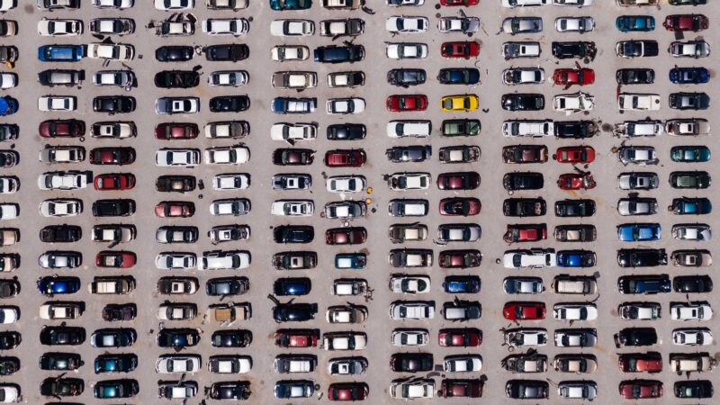 Aerial View of Parking Lot with numerous cars