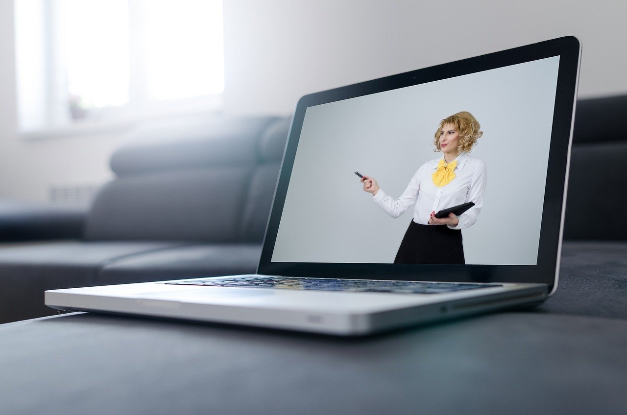 teacher seen on computer screen