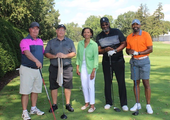 President Monica Posey and golfers