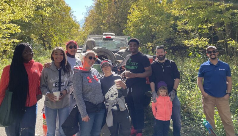 College students, employees, and family members at Great Parks clean-up event