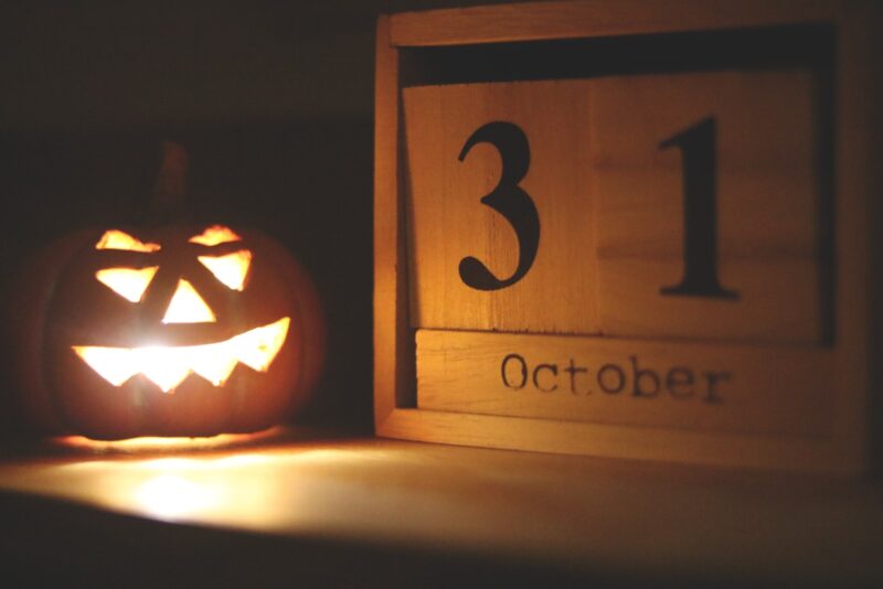Halloween-themed Jack-o-lantern near October 31 Calendar
