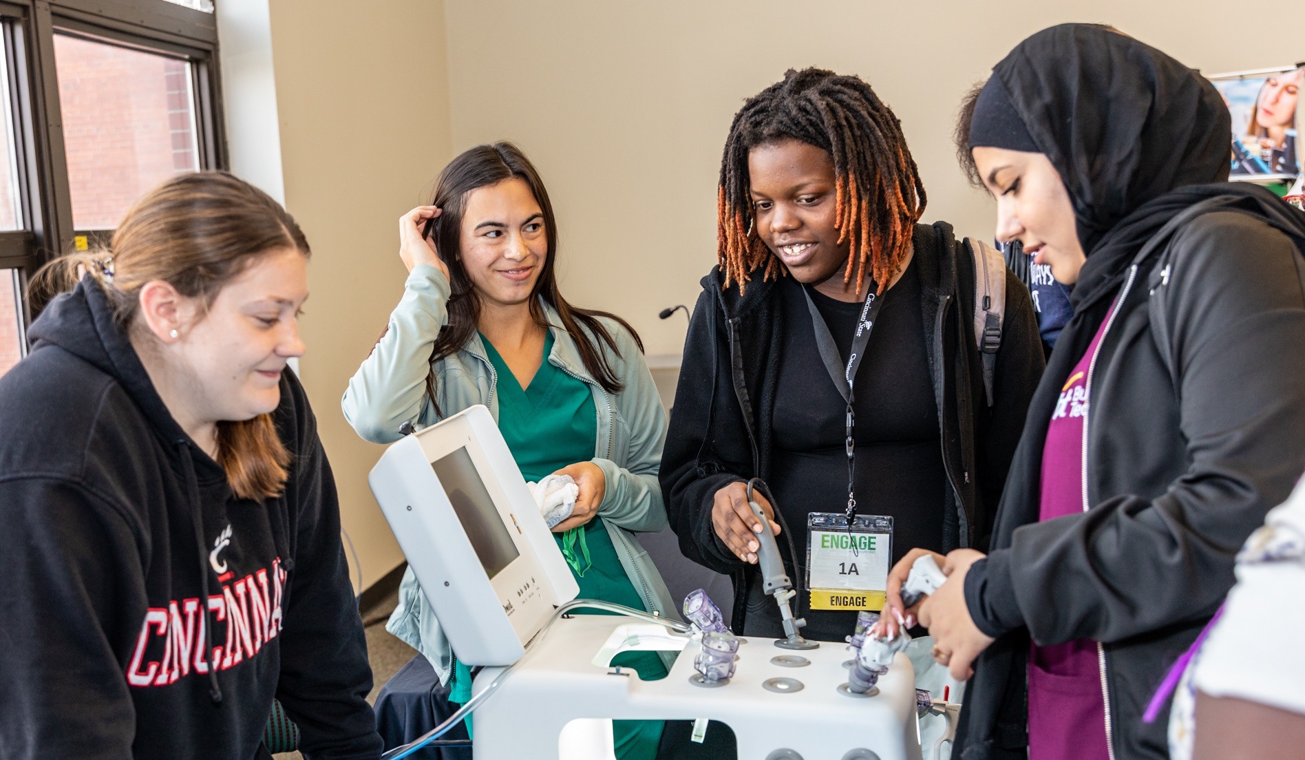 Students use medical equipment at ENGAGE: Students