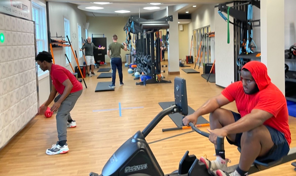 Students using cognitive fitness equipment