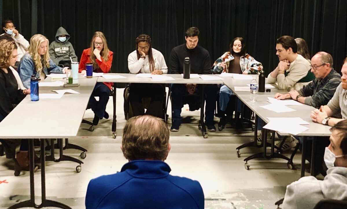 Actors and students at the table read