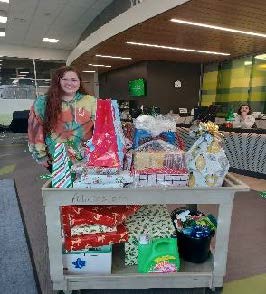 Wrapped gifts on a cart, ready for distribution