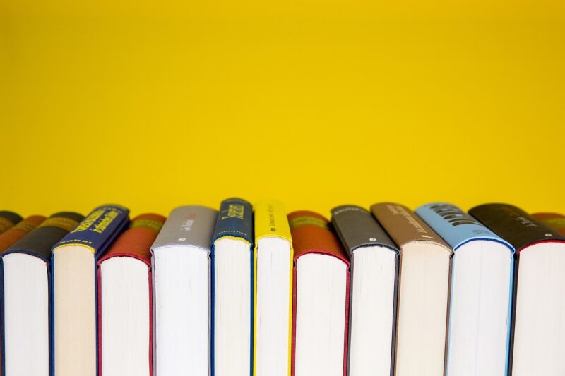 books on a yellow background