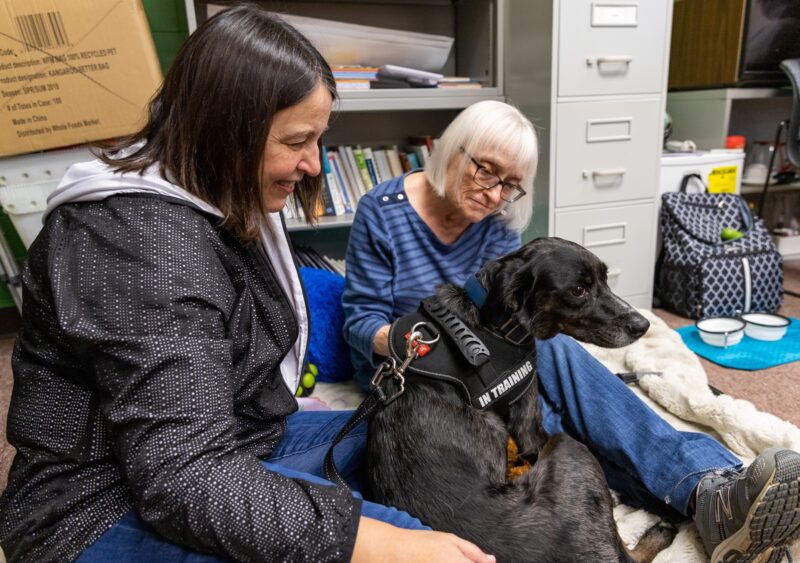 Laura Morris, Mary Frey, and Darwin the emotional support dog