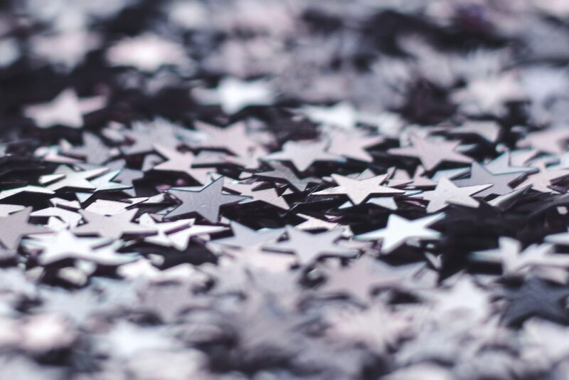 silver stars on a black background
