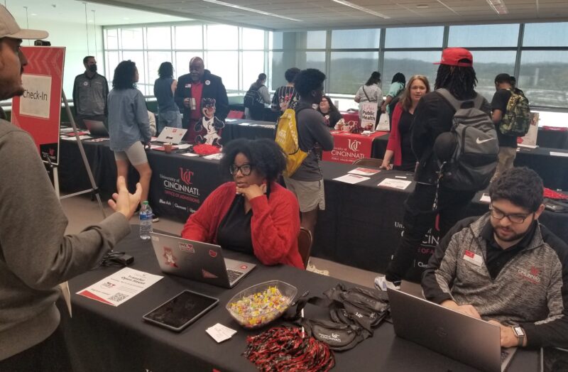 Students talking to UC representatives at Bearcat Fast Track Day