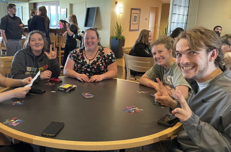 Students playing the SignTasTic card game