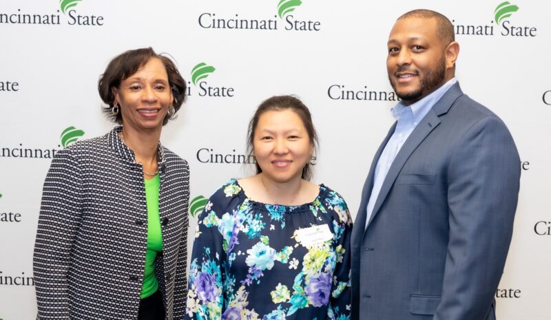 President Monica Posey, Co-op Student of the Year Jeanne Huynh, and Co-op Coordinator Brian Hooten