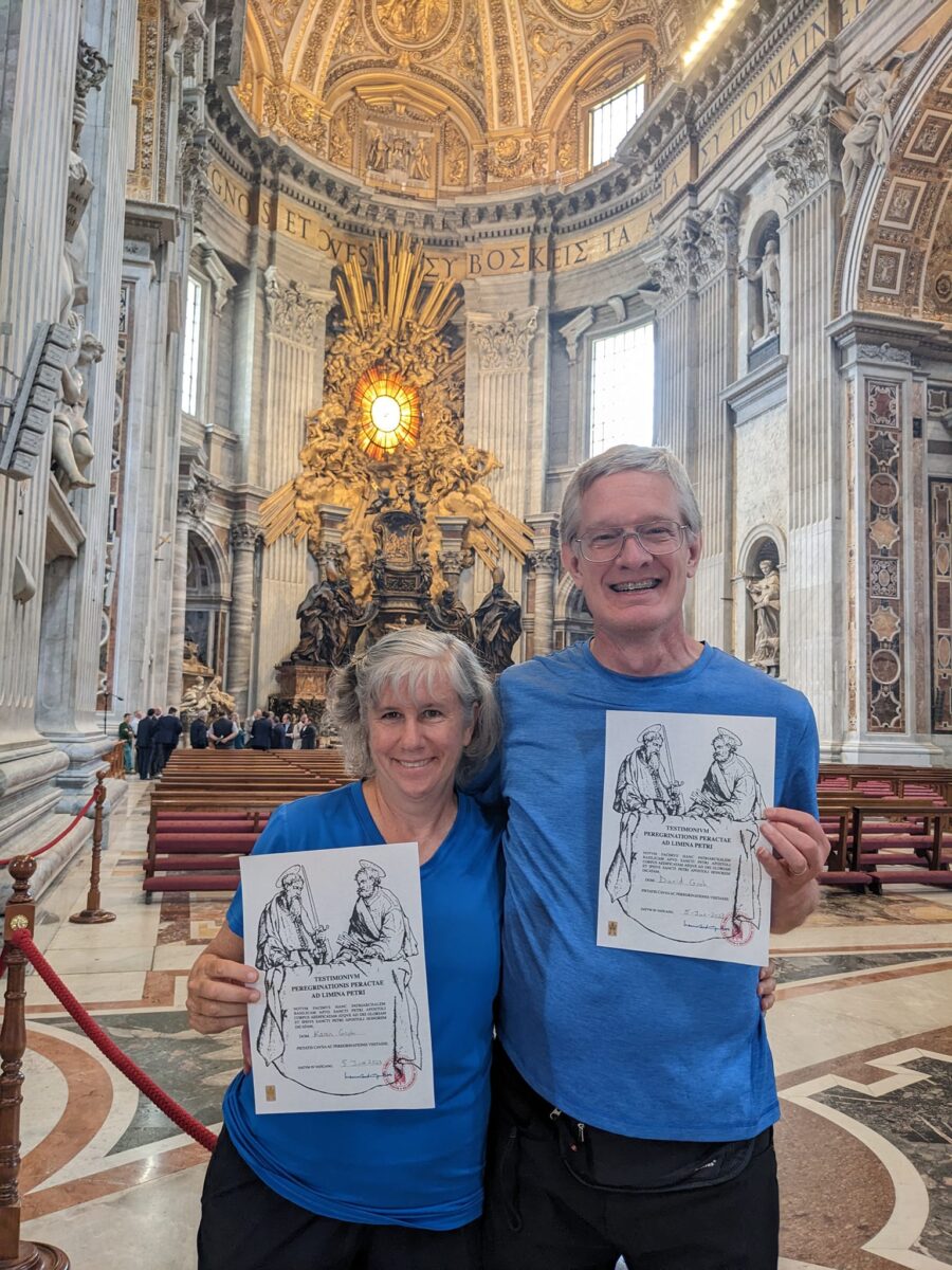 Karen and David Groh display the certificates they received for completing their pilgrimage
