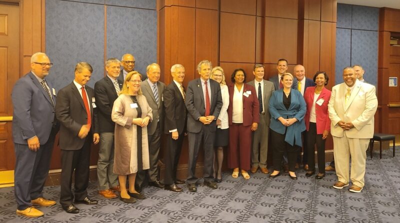 Dr. Monica Posey and other Ohio college and university presidents with Senator Sherrod Brown