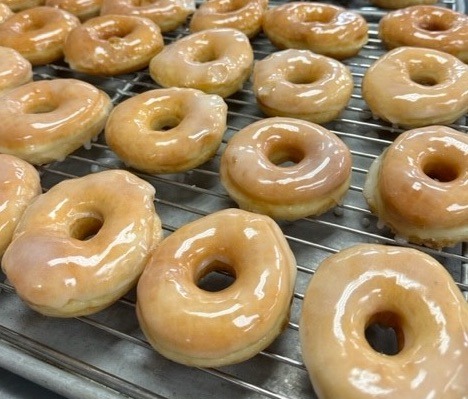 Rack of glazed donuts