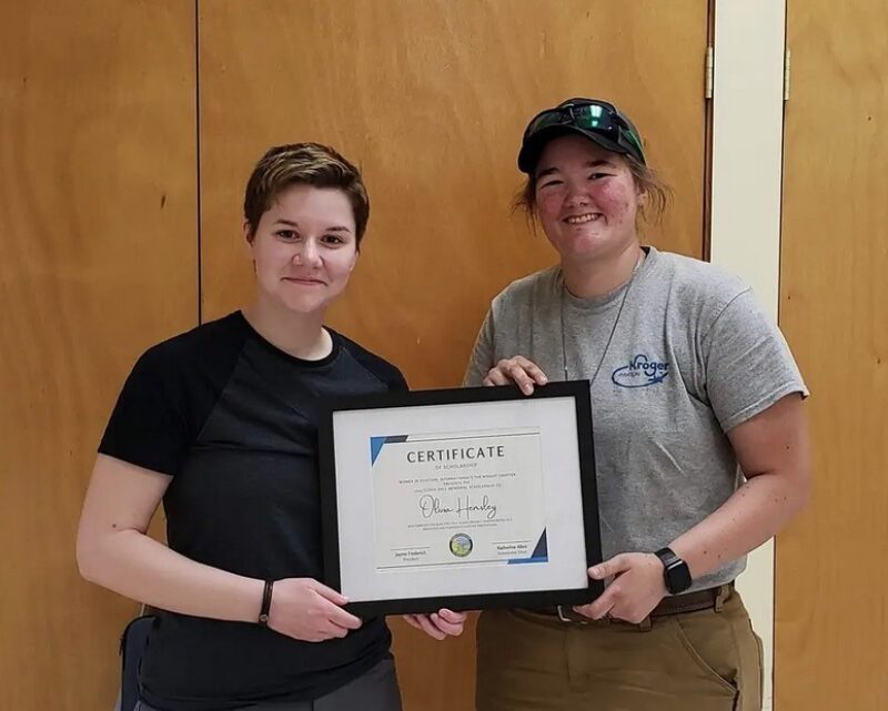 Olivia Hensley receives scholarship award from Jayme Frederick