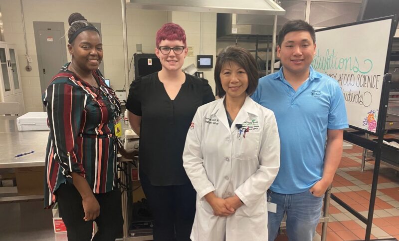 Alicia Manley, Nicole Hatfield, Program Chair Grace Yek and Matt Schmidt in the Culinary & Food Science Lab at Cincinnati State