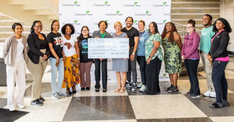 Joyce Fugate presents check for Nursing scholarships to Dr. Monica Posey and Nursing students