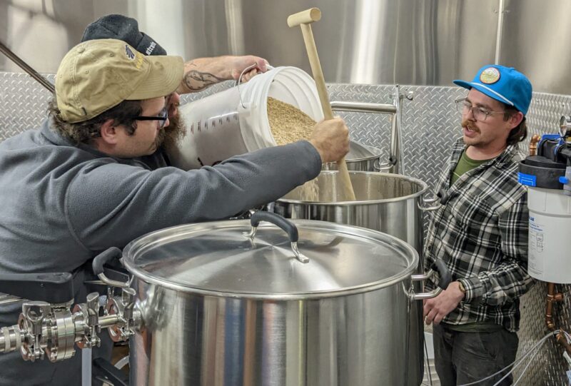 Brewing Science students Matthew Poblenz and Eric Herzog with Brewing Science instructor Brad Brooks