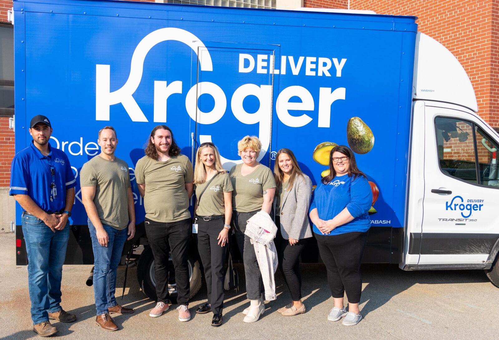 Kroger volunteers brought a truckload of food to the Surge Cupboard Food Pantry
