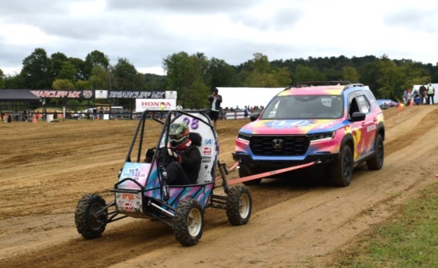CincyBaja car towing a full-sized SUV to win the Pilot Pull event