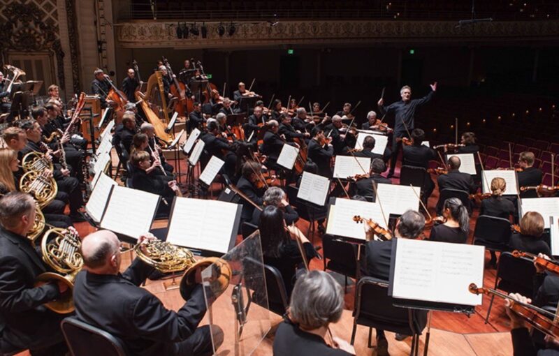 Photo of the Cincinnati Symphony Orchestra playing on a stage