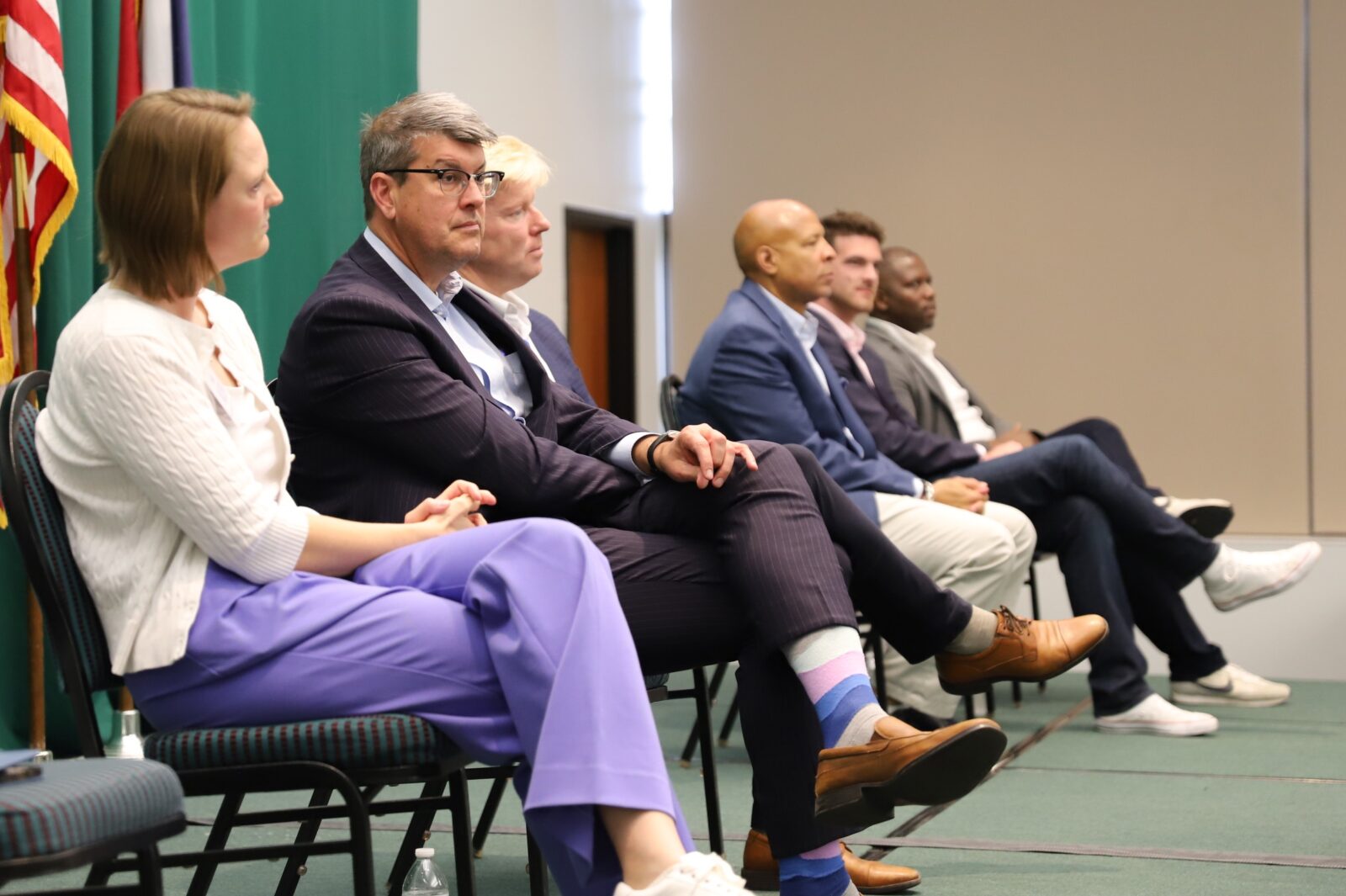 Candidates wait to speak