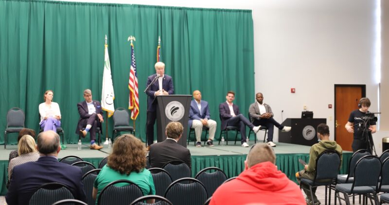 Candidates speaking or waiting to speak at City Council Candidate Forum