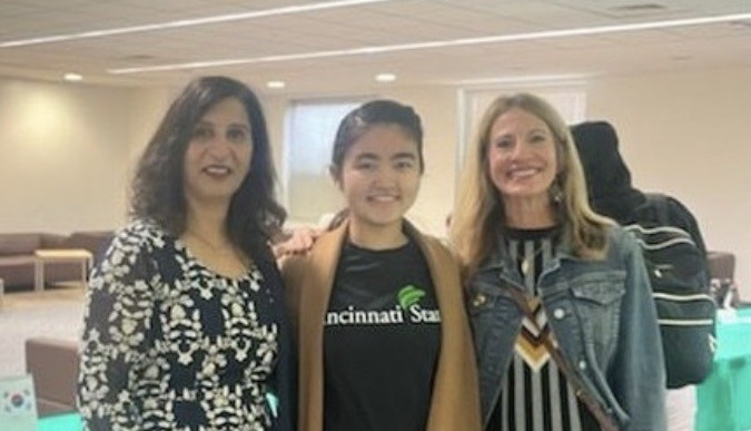 Event organizers Reena Goel, Nozina Eshkobilova, and Jayne Dressing