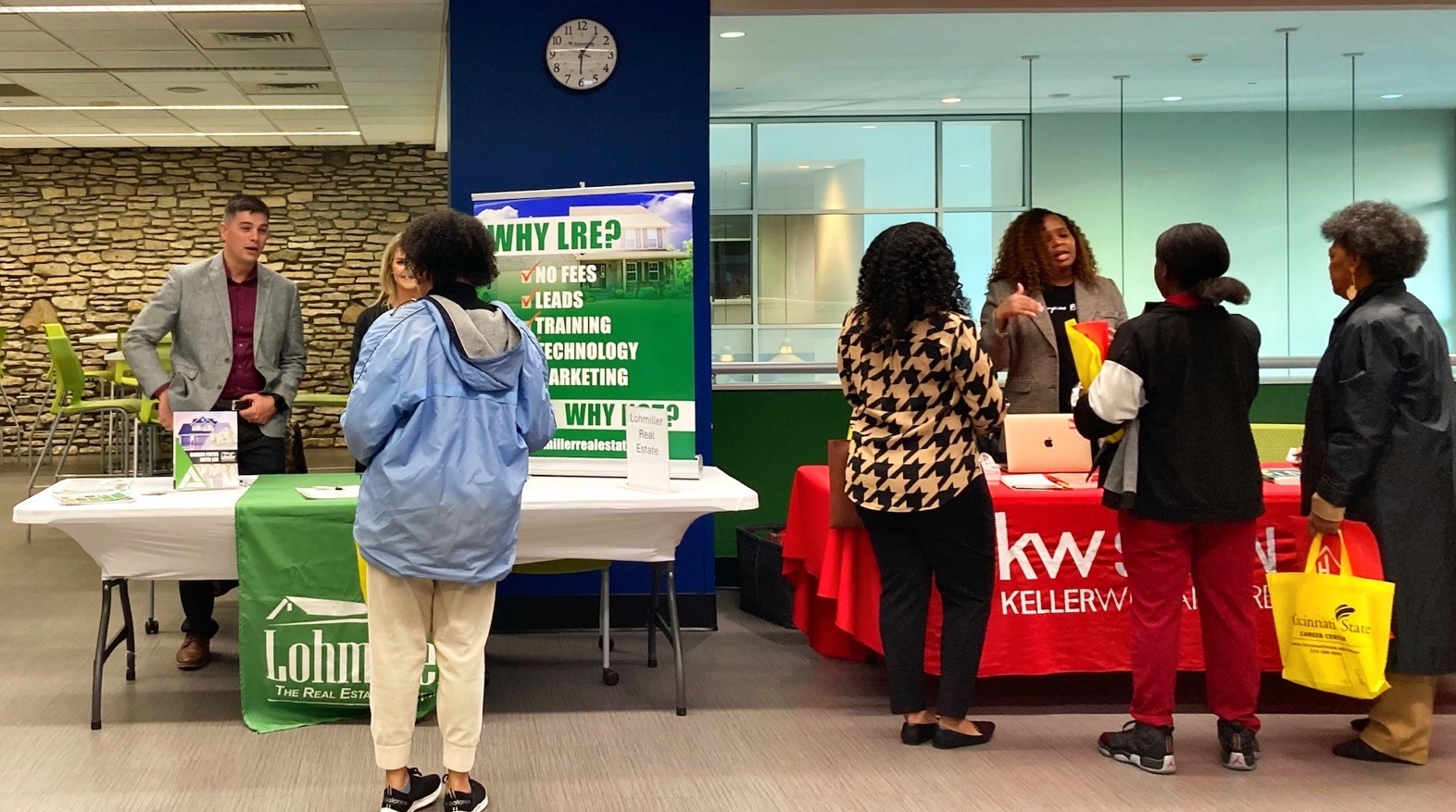 Students talking to professionals at the Real Estate event