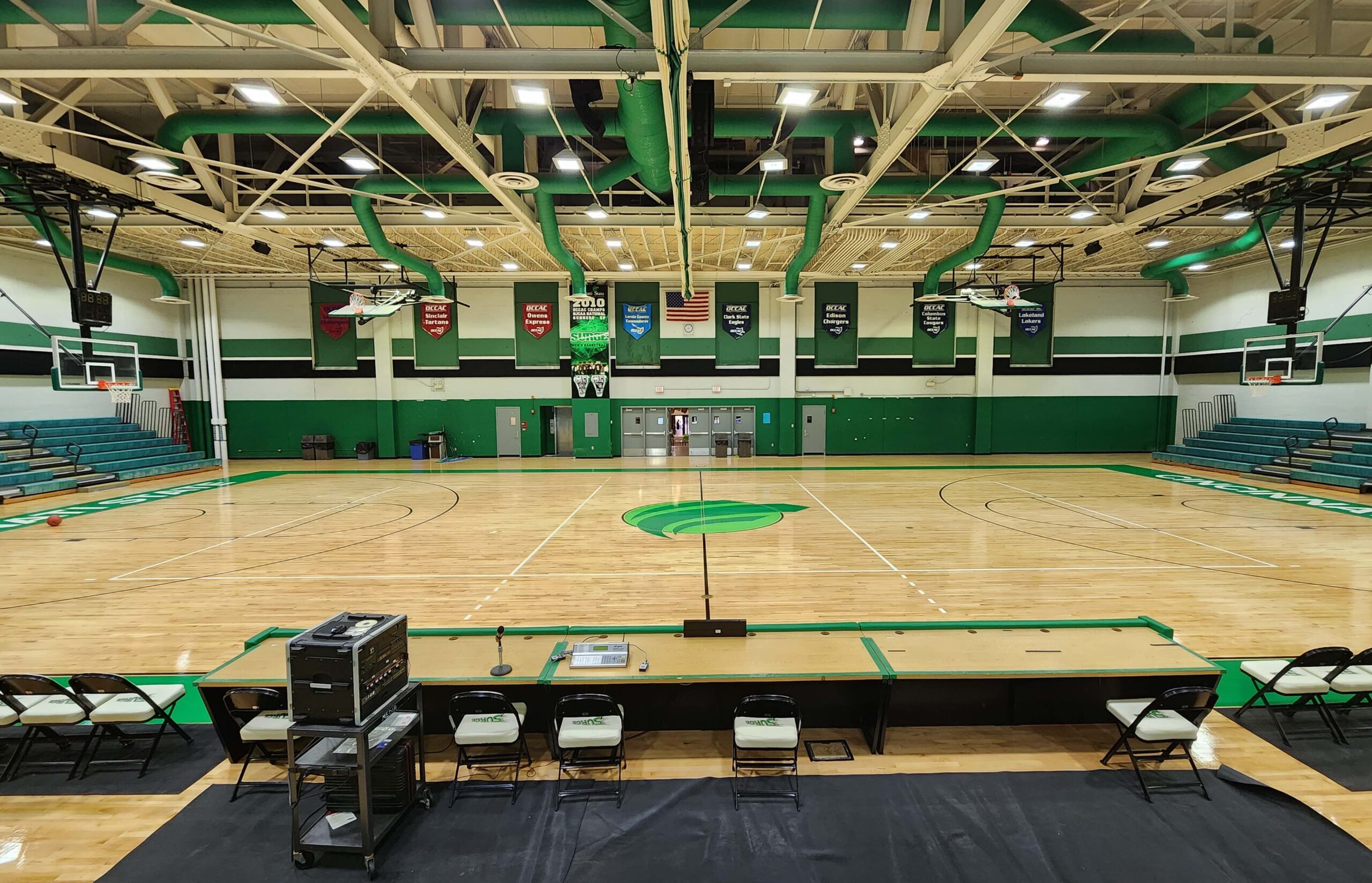 Cincinnati State refinished basketball court seen from the scorer's table