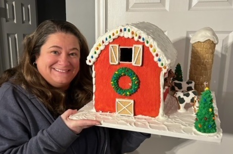 Allison Czirr and her gingerbread barn