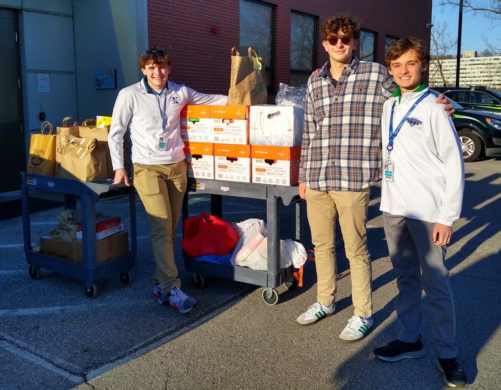 St. Xavier HS students delivering Food Pantry donations