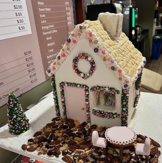 White gingerbread house constructed by Pastry Arts students