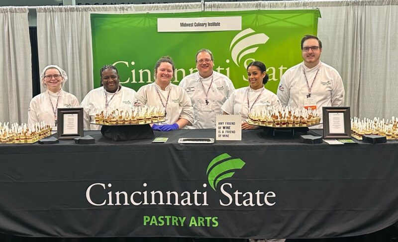 Students and faculty at the Pastry Arts booth at the Cincinnati International Wine Festival 2024