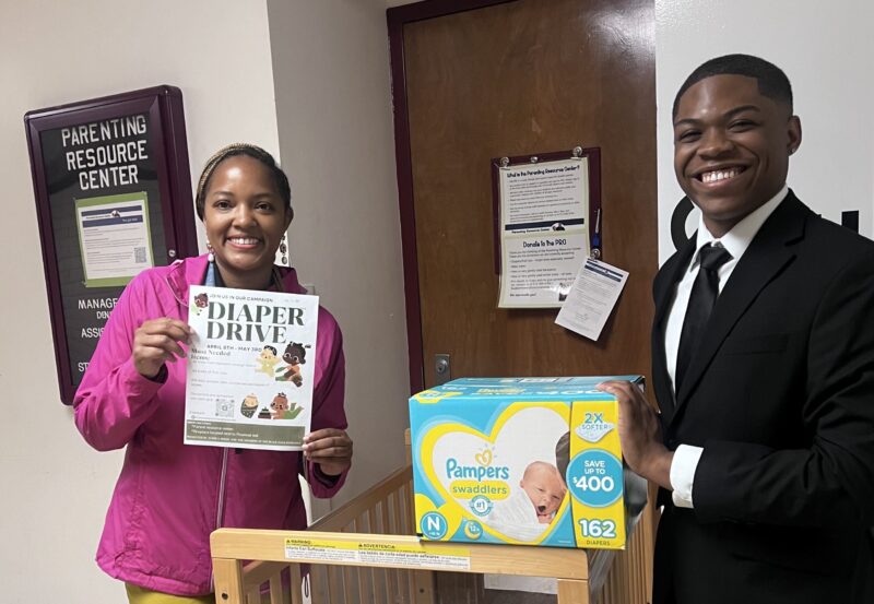 Yoshua Simms delivering donated diapers to Latoya Turner