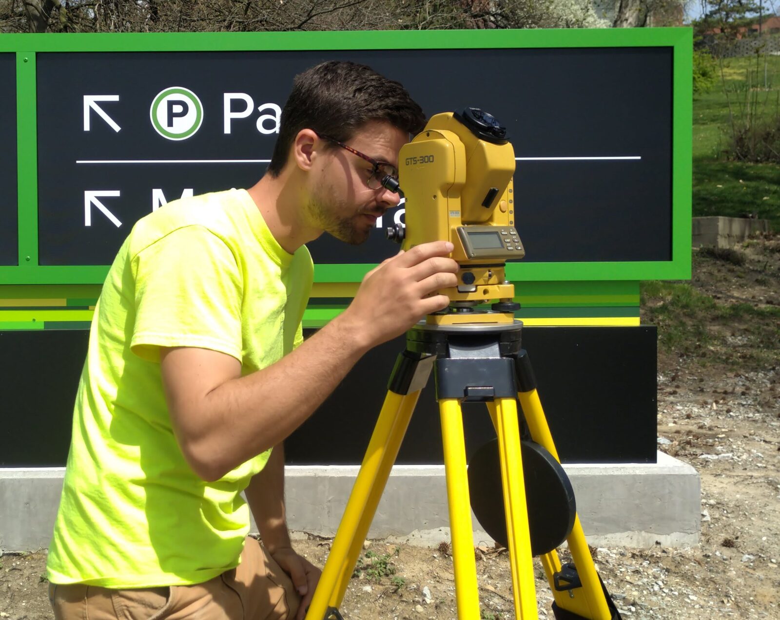 Ethan Armstrong with total station survey instrument - 4-8-24