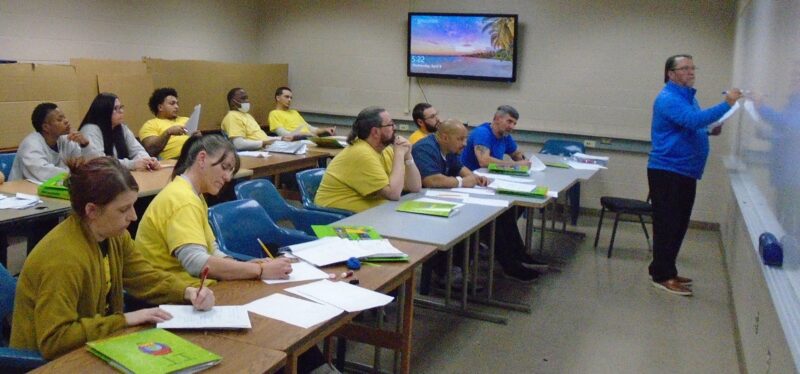 Bob Nields leads a class activity for students at River City Correctional Center