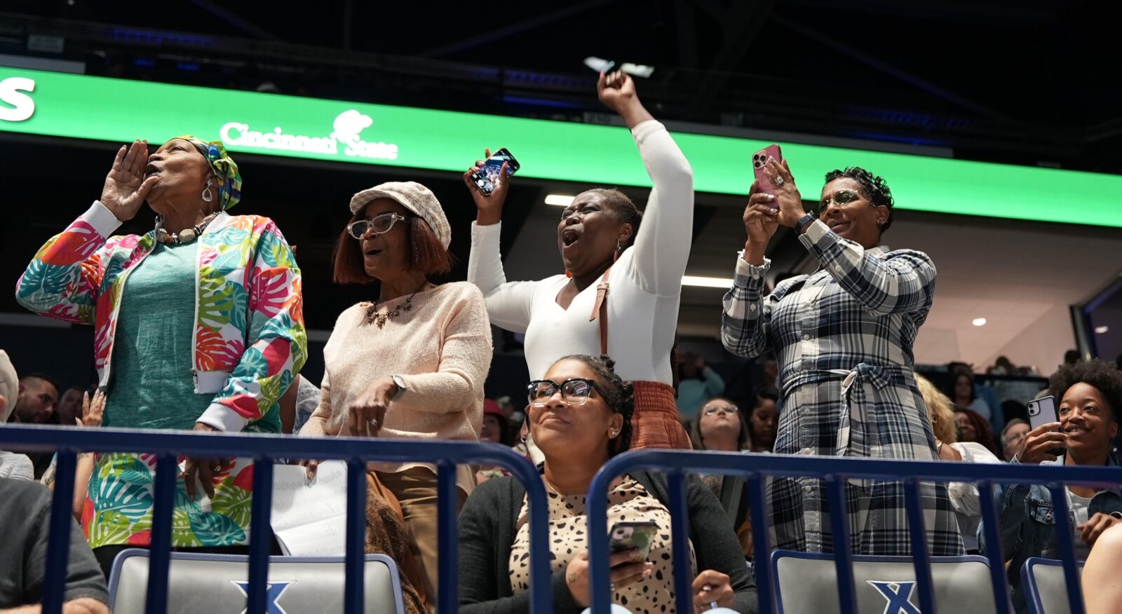 Family members applauding the graduates