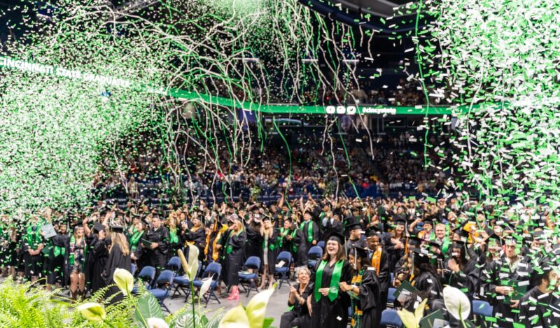 Confetti falling on graduates at Cincinnati State commencement