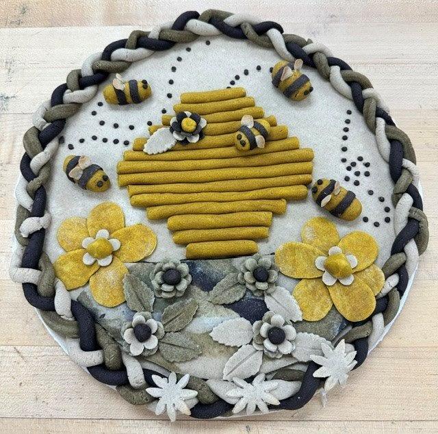 "Dead dough" sculpture - beehive, bees, and yellow flowers