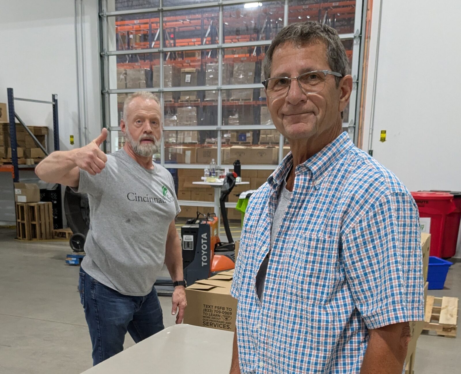 Faculty Senate at Freestore Foodbank - Jon McKamey and Doug Woodruff