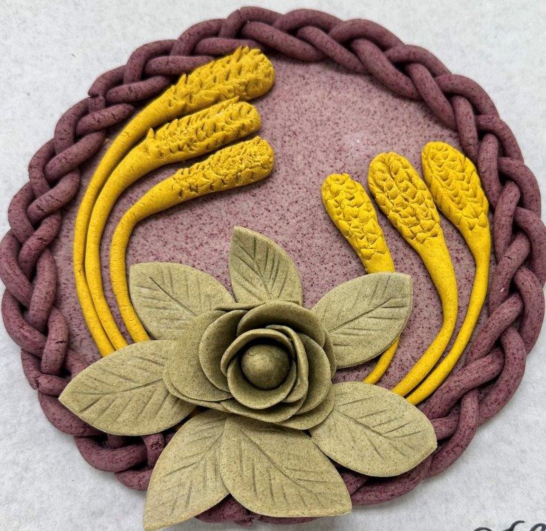 "Dead dough" sculpture - green flower and leaves, yellow stalks of wheat