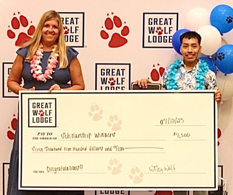 Wilber Gonzalez receives Great Wolf Lodge scholarship check