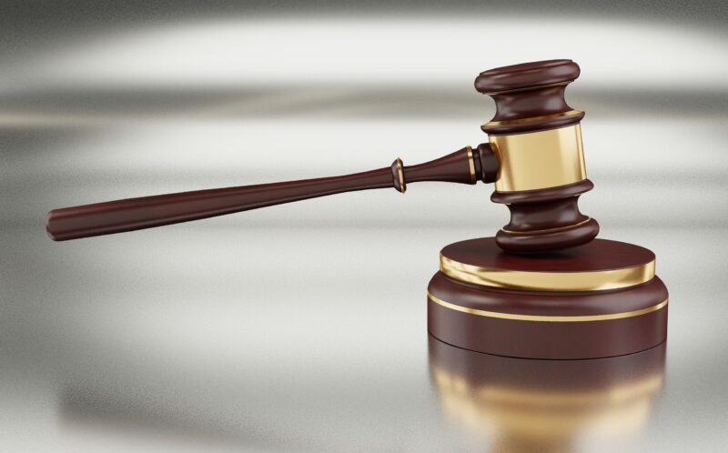 wooden gavel with gold band