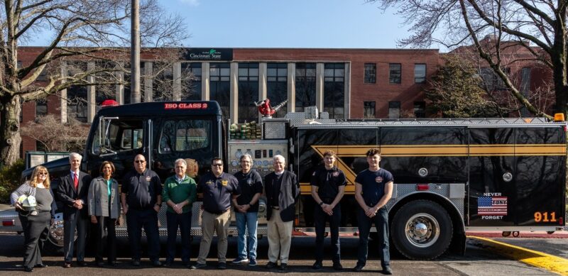 Cincinnati State and Glendale officials with donated fire truck