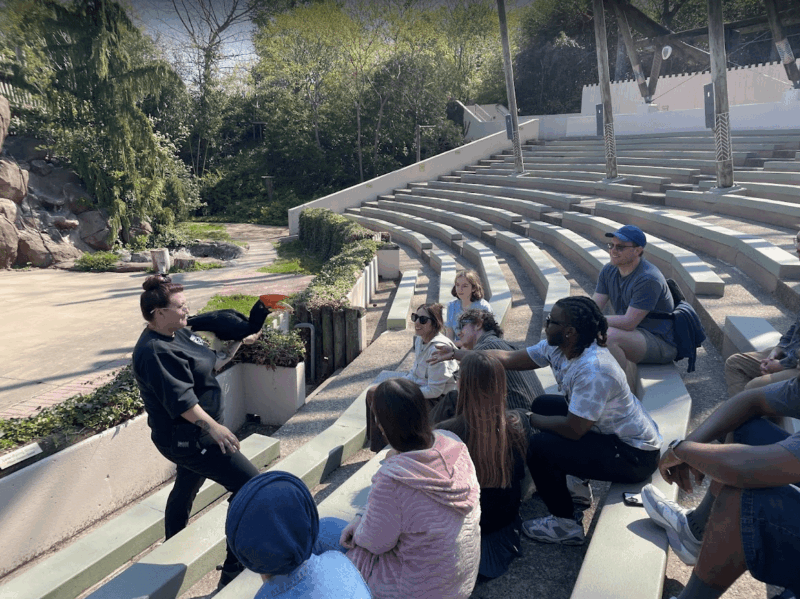 Biology students observing a Rhinoceros Hornbill at the Cincinnati Zoo