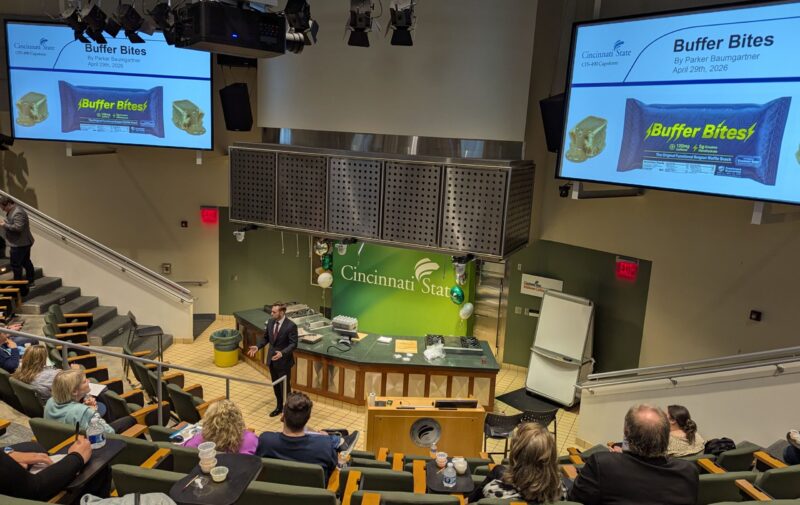Parker Baumgartner giving his presentation for his product, Buffer Bites