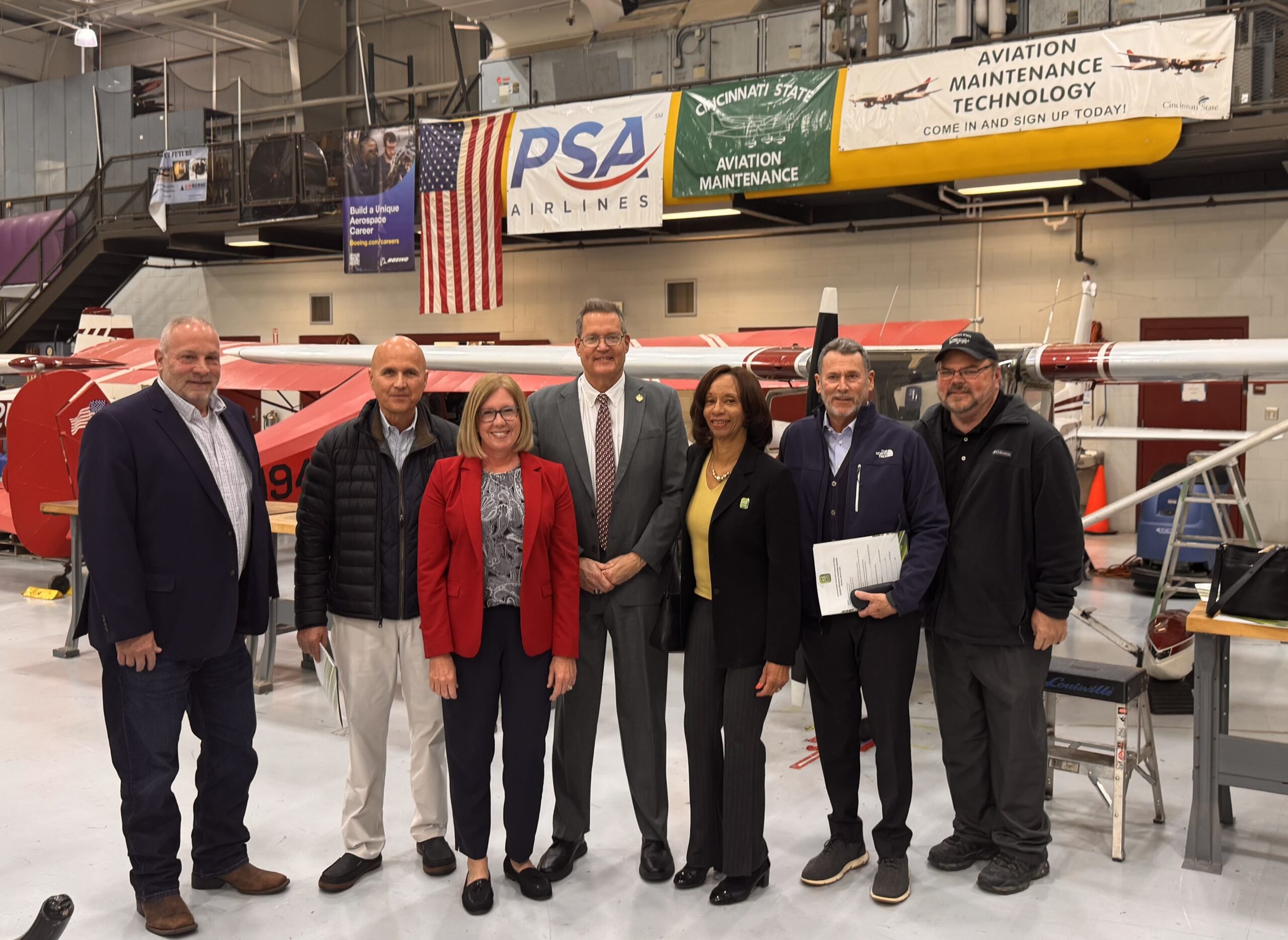 SW Ohio legislators visited Cincinnati State's Harrison Campus (from left): Harrison Councilmember Doug Abrams, US Senator Bernie Moreno Regional Director Steve Leahy, State Representative Mike Odioso, State Representative Cindy Abrams, President Monica Posey, Trustee John Silverman, Aviation Maintenance Technology Program Chair Jeff Wright