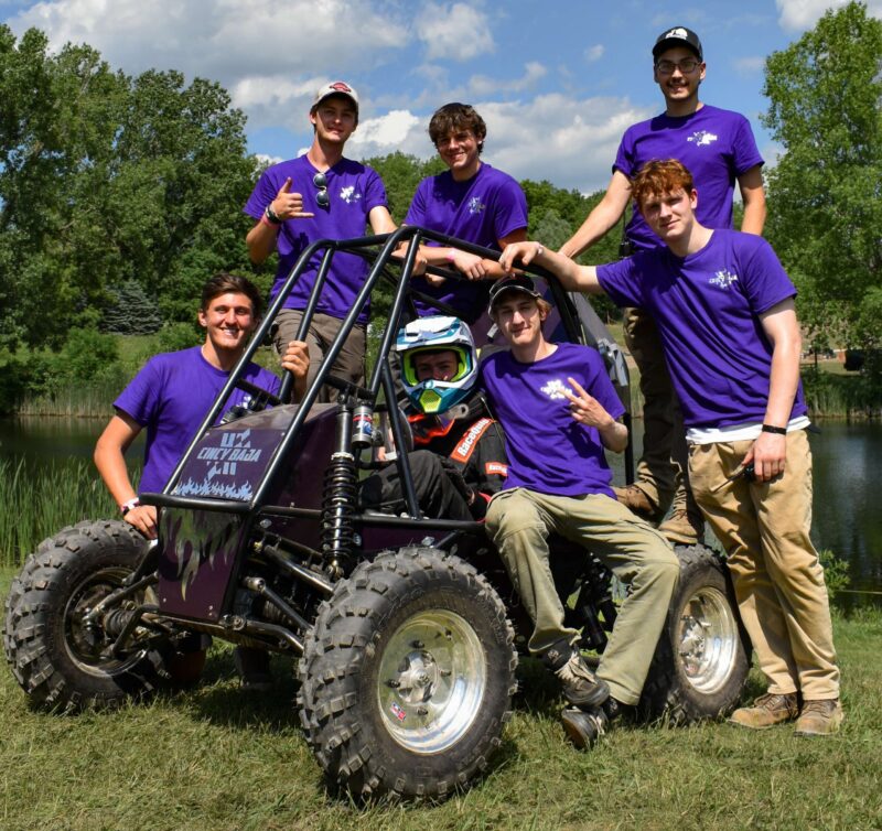 Cincy Baja Team - Fall 2026: (back row, from left) Alex Bloemer, Cole Weis, Ben Scheffter (front row, from left) Ethan Timon, Dave Lanning (driver), Ian Dressing, Jeff Fawcett