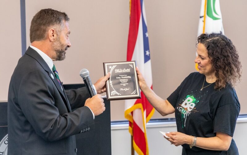 Pres. Robbin Hoopes presenting plaque to Amy Waldbillig at farewell event - 9-8-26